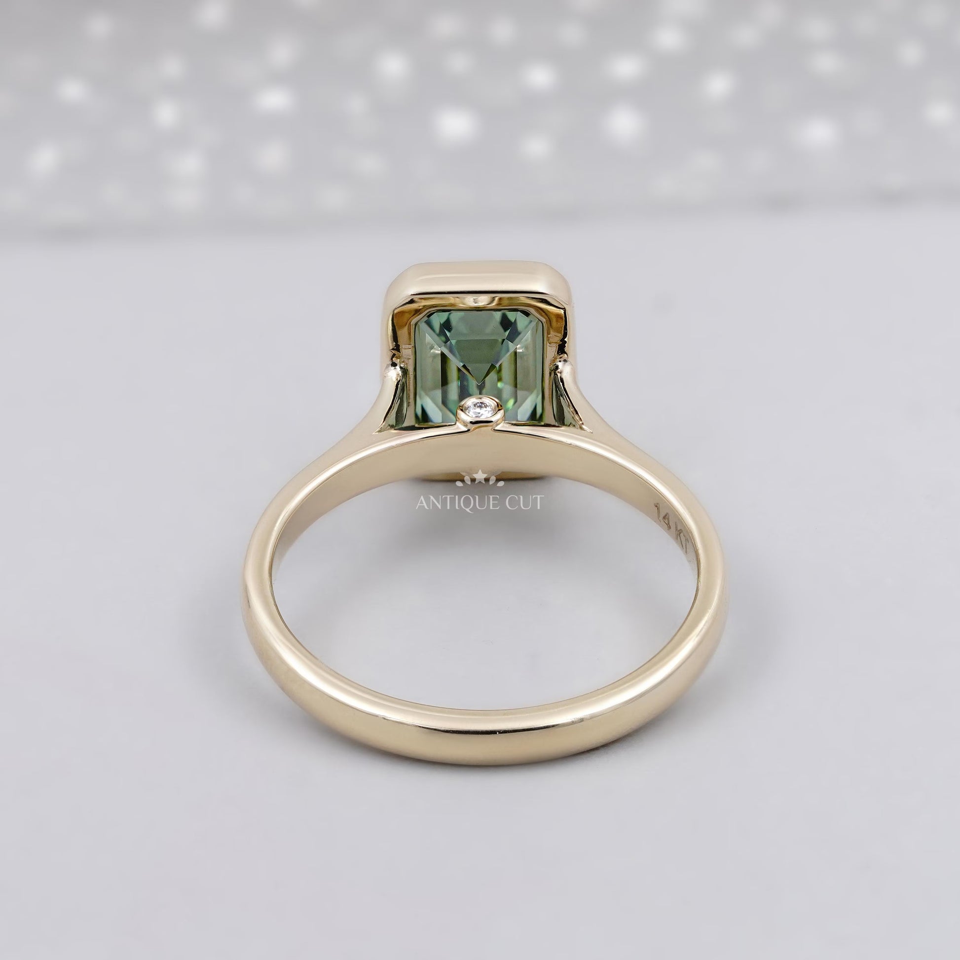 14K yellow gold bezel set green sapphire ring