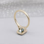 Bezel set green sapphire engagement ring