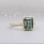 IGI Certified emerald cut green gemstone bridal ring