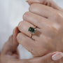Elegant emerald cut green sapphire bridal ring