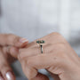 Modern solitaire green sapphire engagement ring