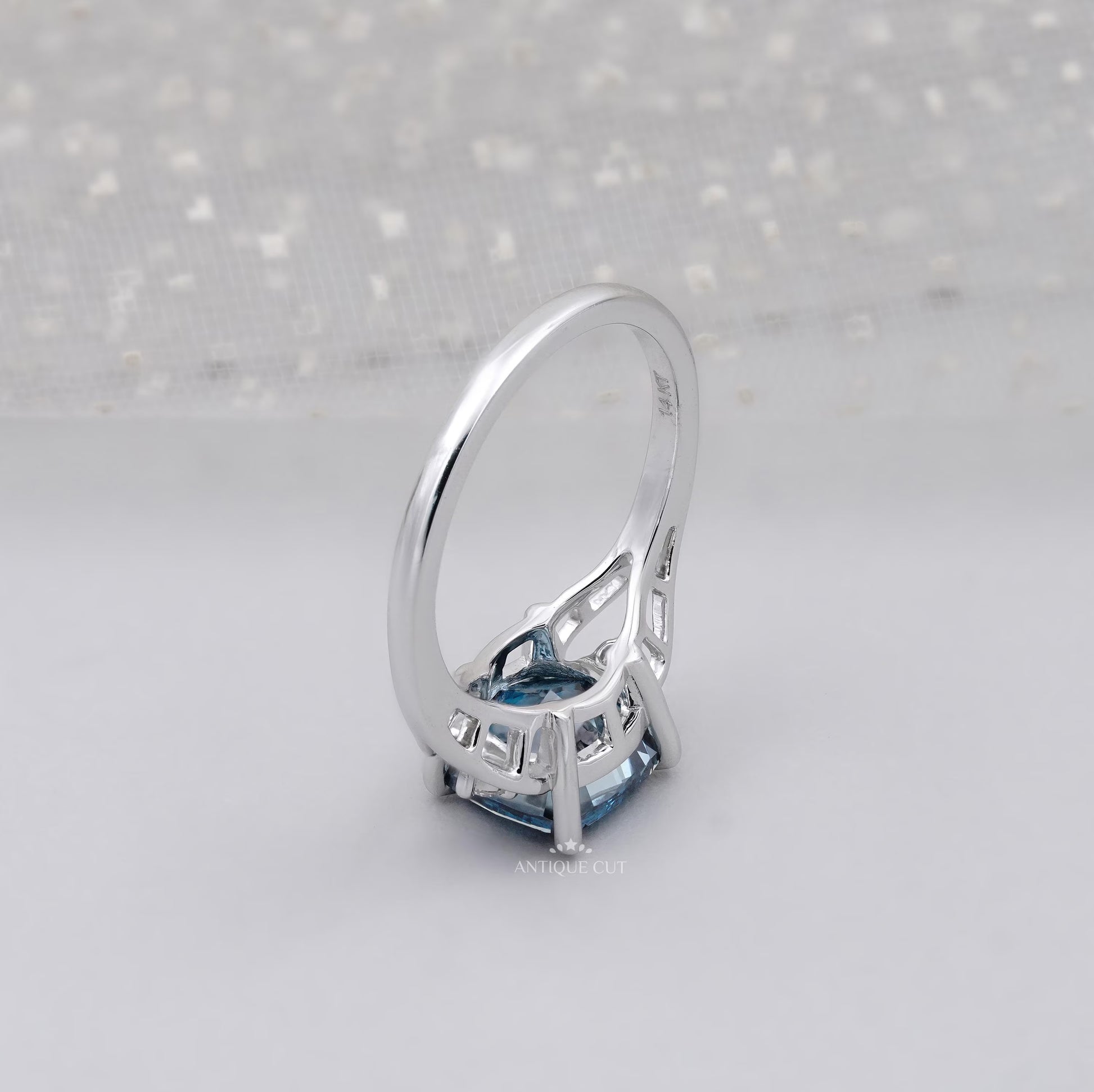 Cushion cut blue diamond bridal ring design