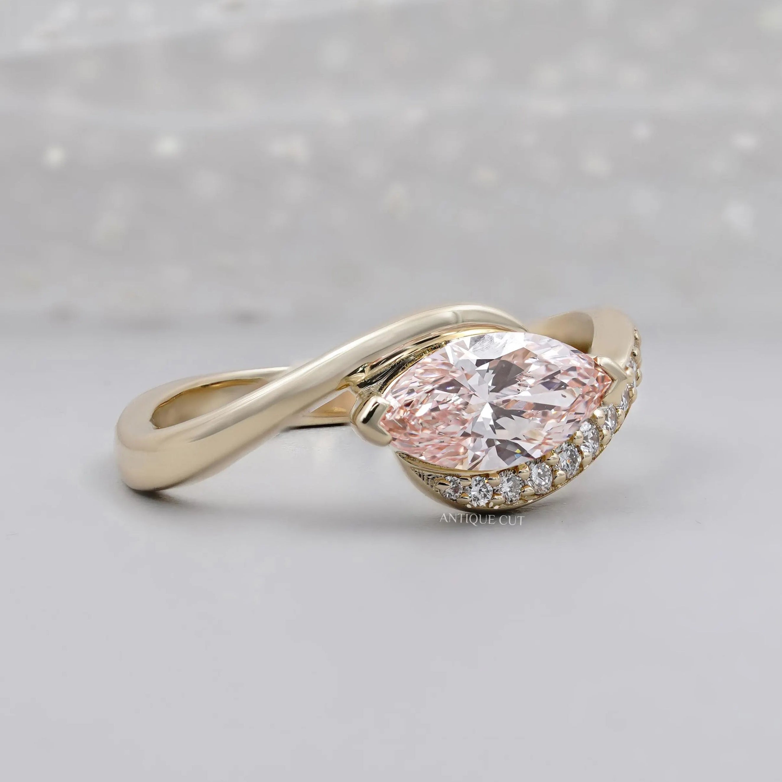 Marquise cut pink diamond bypass ring design