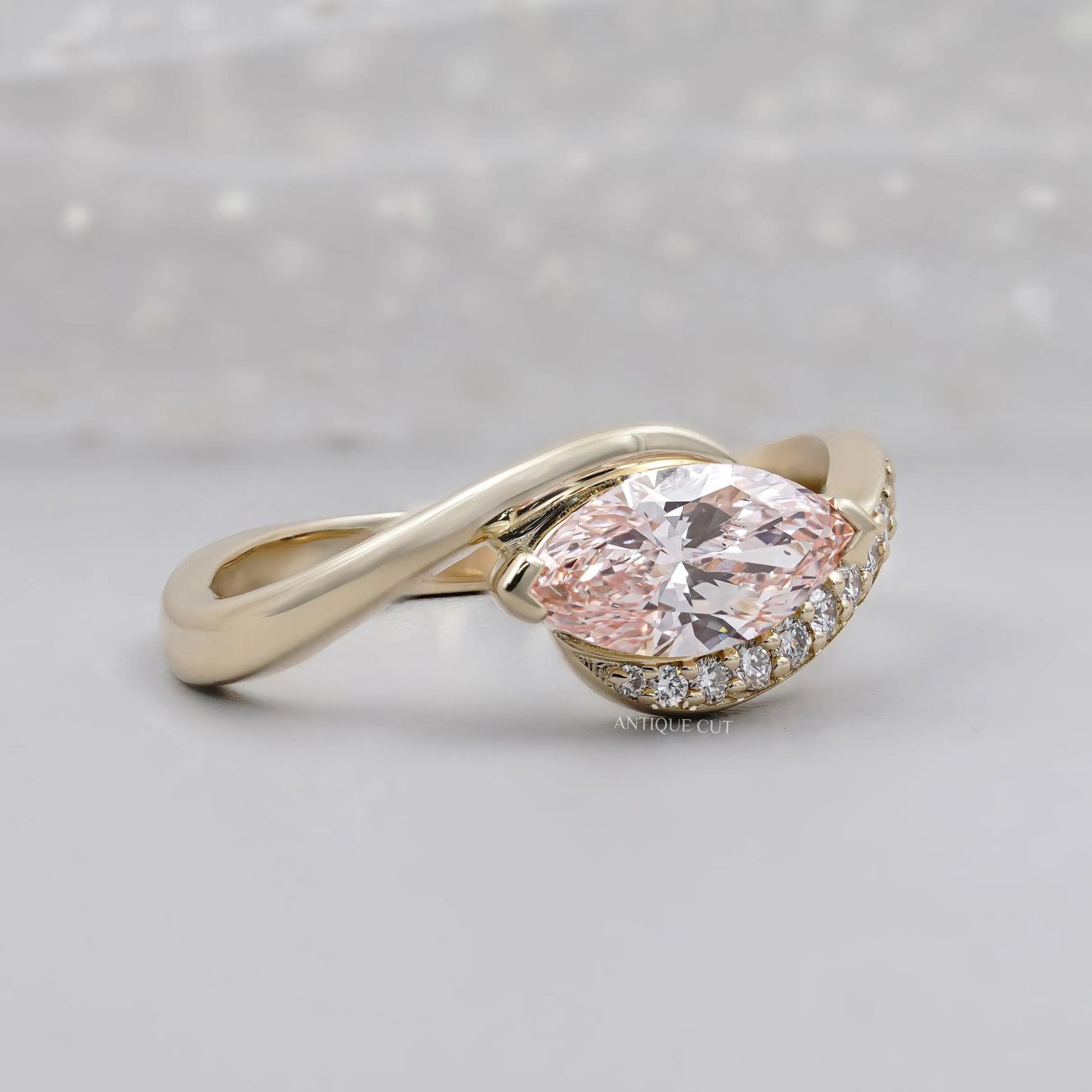 Marquise cut pink diamond bypass ring design