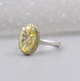 Antiquecut fancy yellow diamond double halo engagement ring