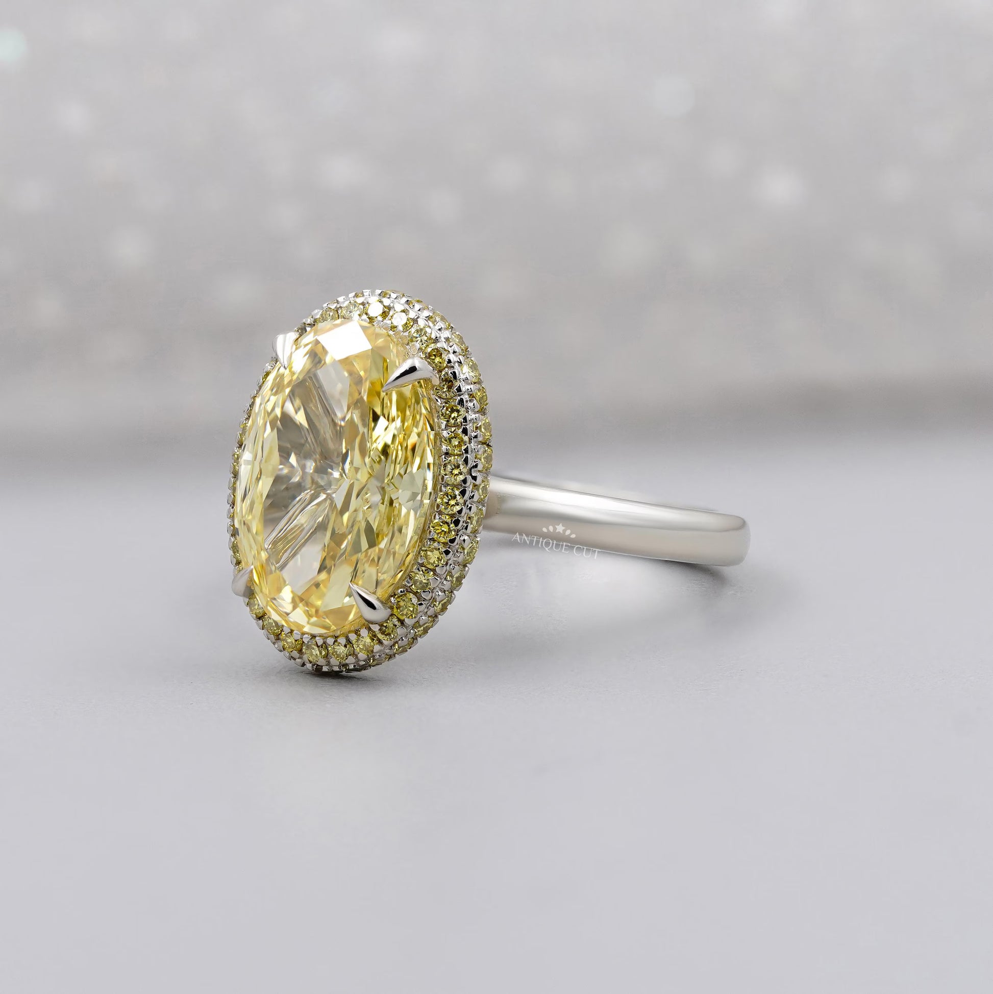 Antiquecut fancy yellow diamond double halo engagement ring