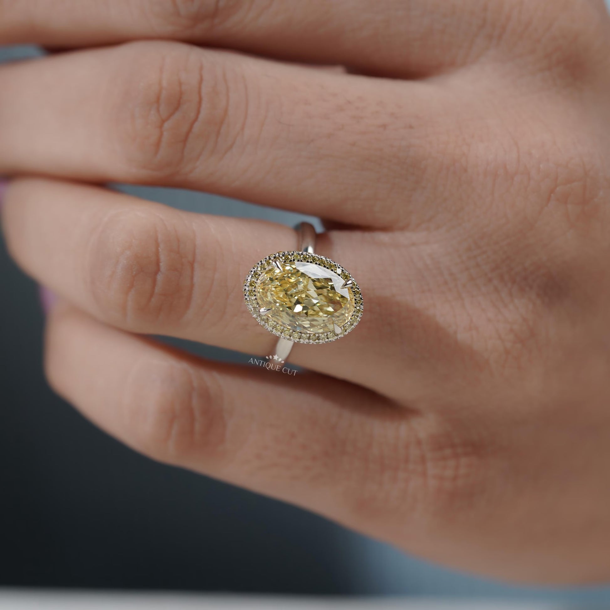 Modern oval cut yellow diamond double halo ring
