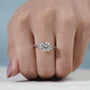 Luxury lab grown diamond engagement ring with cushion cut center and baguette side stones.