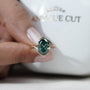 Modern yellow gold oval diamond engagement ring