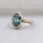 Antiquecut fancy green oval diamond solitaire engagement ring