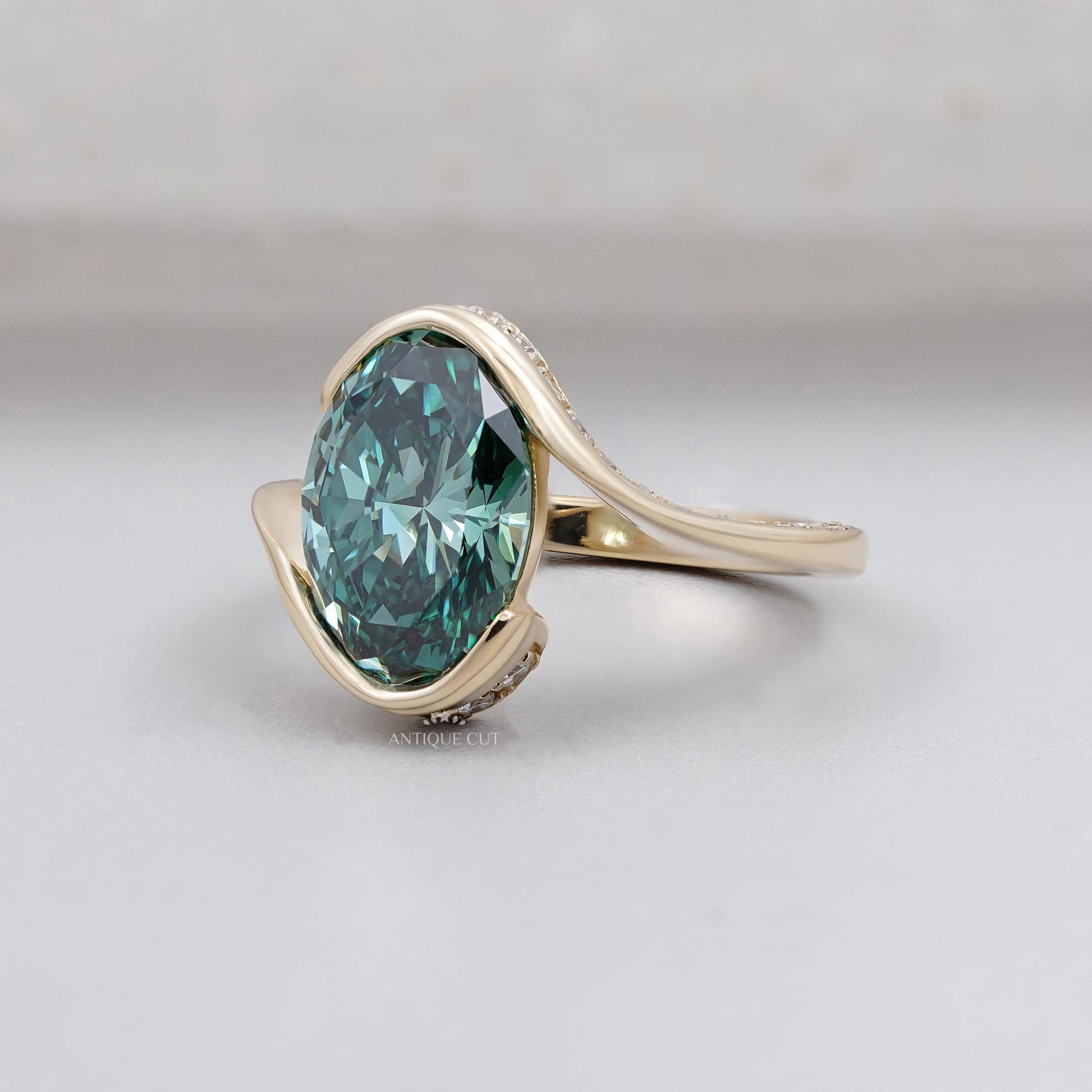 Antiquecut fancy green oval diamond solitaire engagement ring