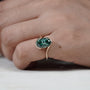 Elegant oval green diamond engagement ring