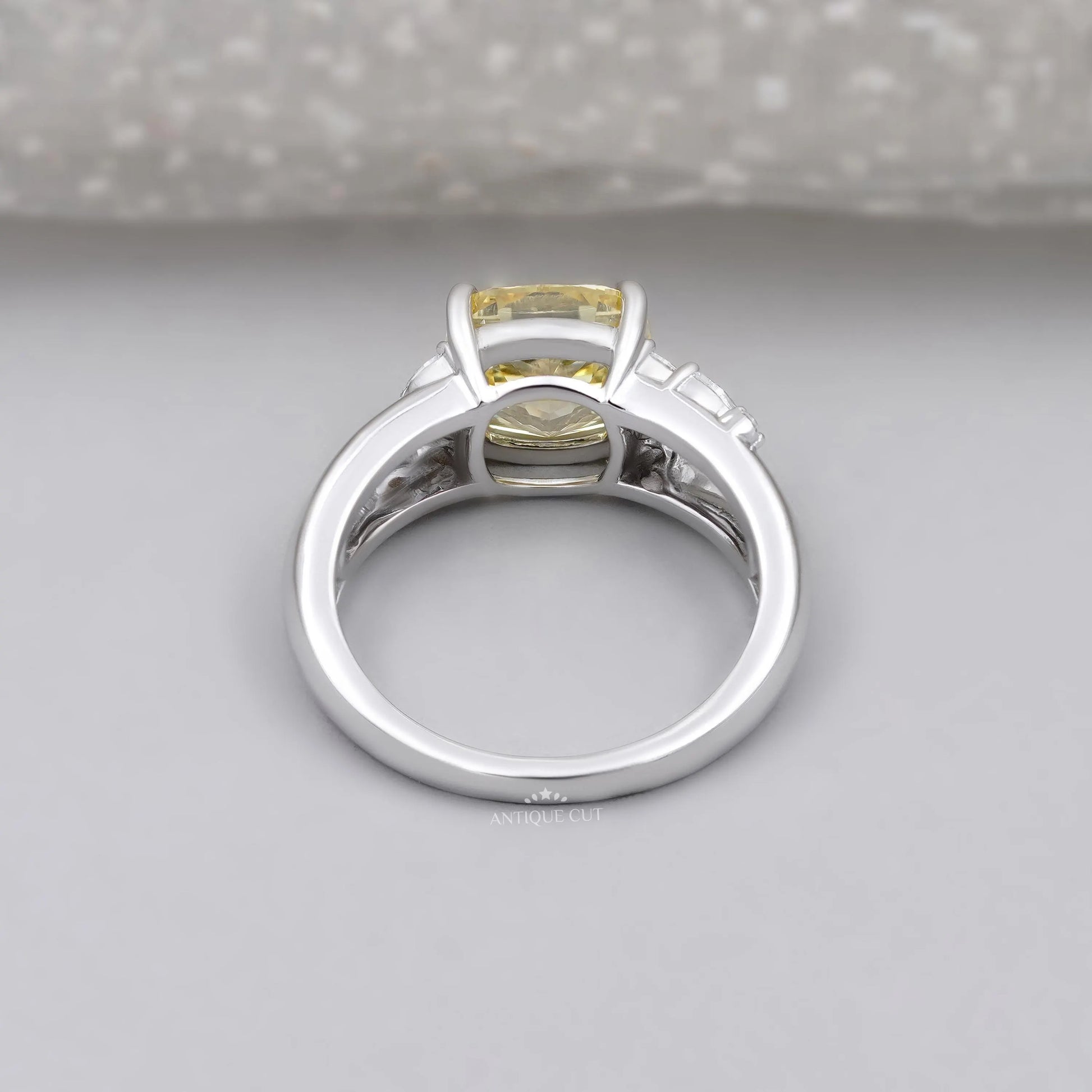 Lab grown diamond engagement ring with marquise and round sides