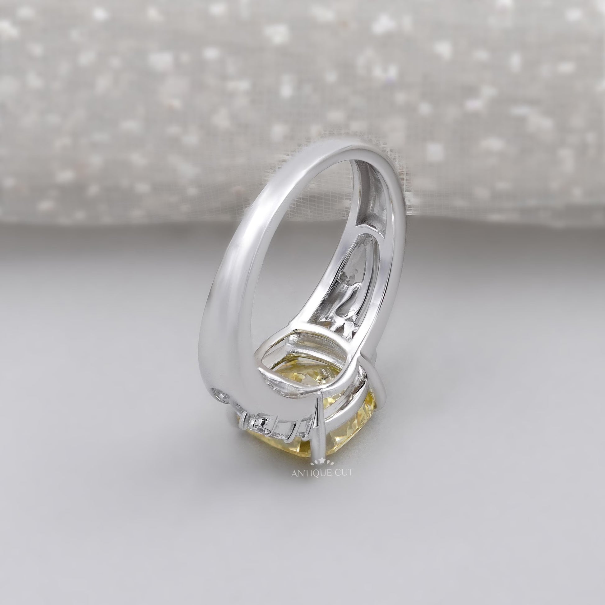 Elegant cushion cut yellow diamond engagement ring
