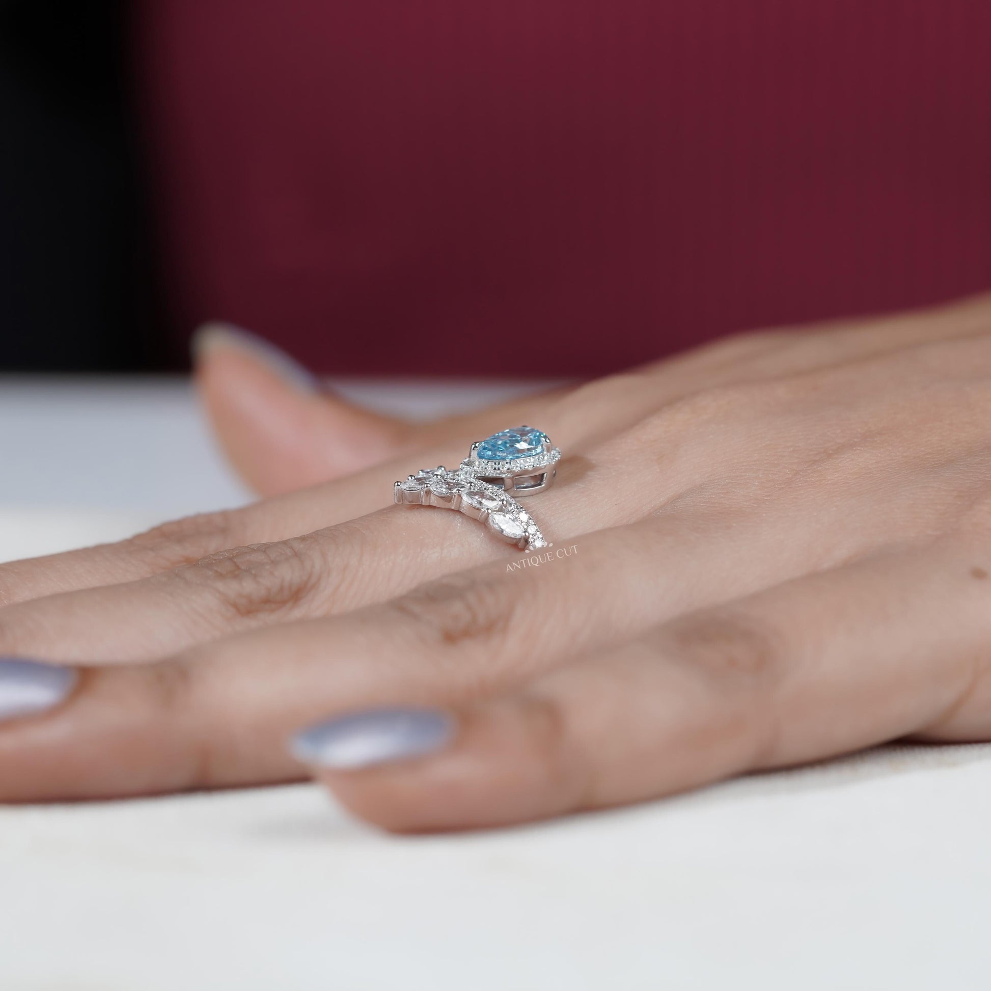 Pear shaped fancy blue diamond engagement ring