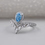 Antiquecut pear cut fancy blue diamond ring