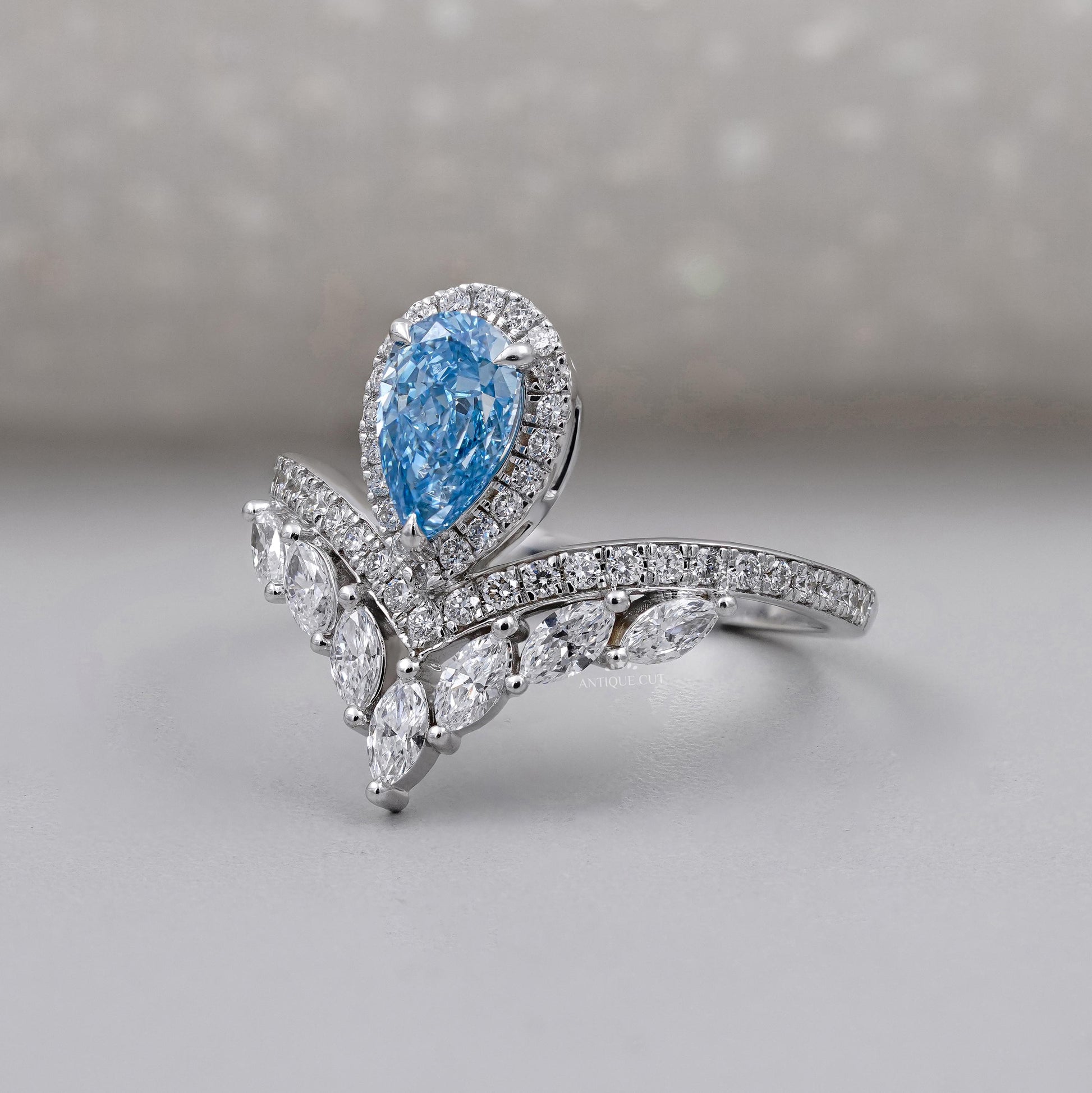 Antiquecut pear cut fancy blue diamond ring