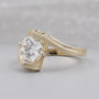 Yellow gold round diamond engagement ring with heart halo
