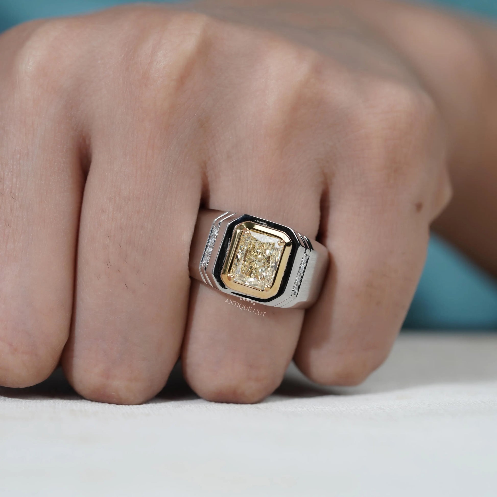 Contemporary yellow gold cushion cut diamond ring
