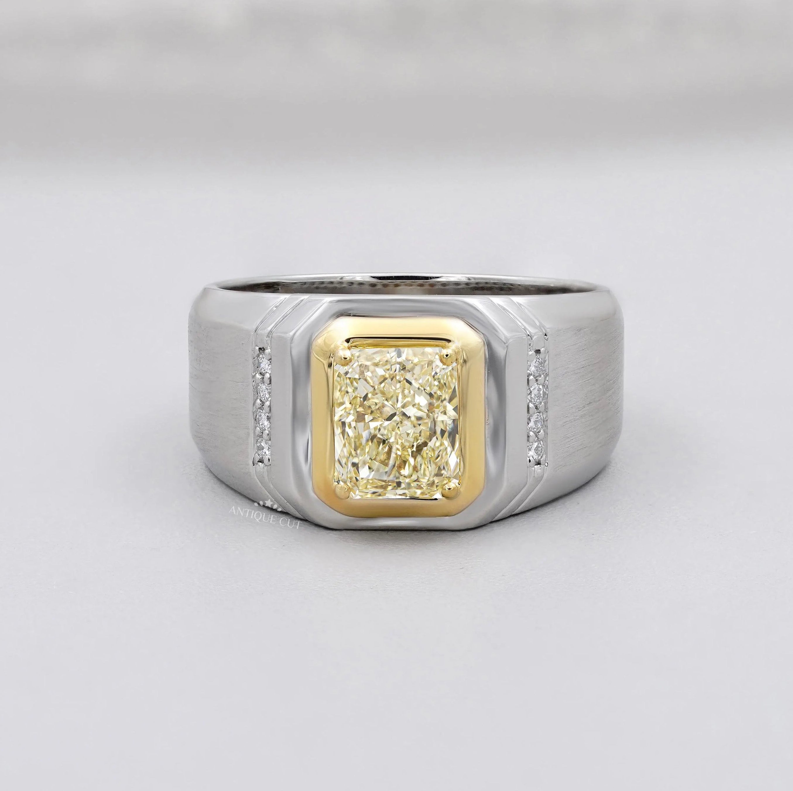 Yellow Radiant Cut Diamond Men's Engagement Ring In White Gold Wide Band Bezel Style Round Side Stone IGI Certified