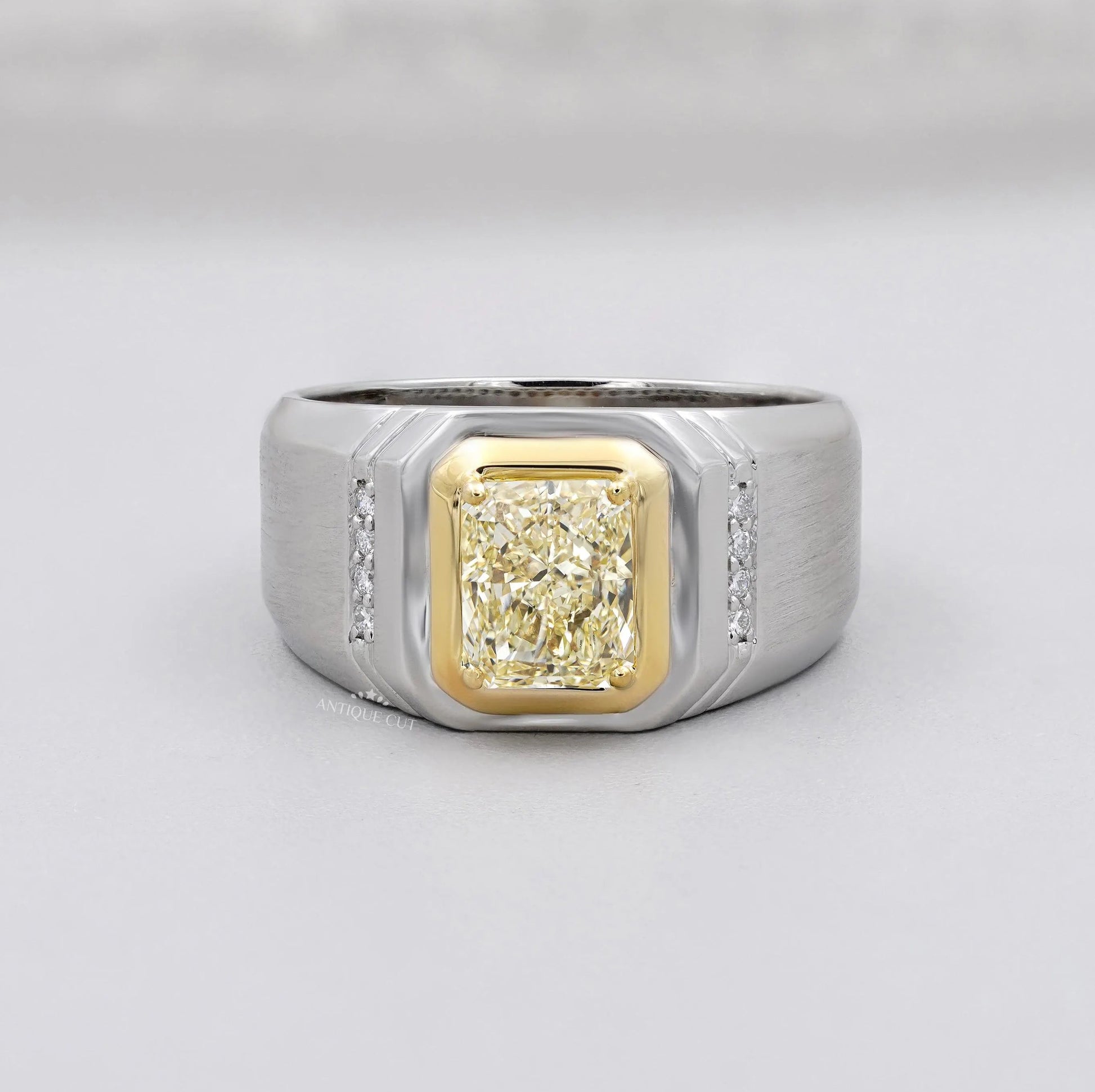 Yellow Radiant Cut Diamond Men's Engagement Ring In White Gold Wide Band Bezel Style Round Side Stone IGI Certified
