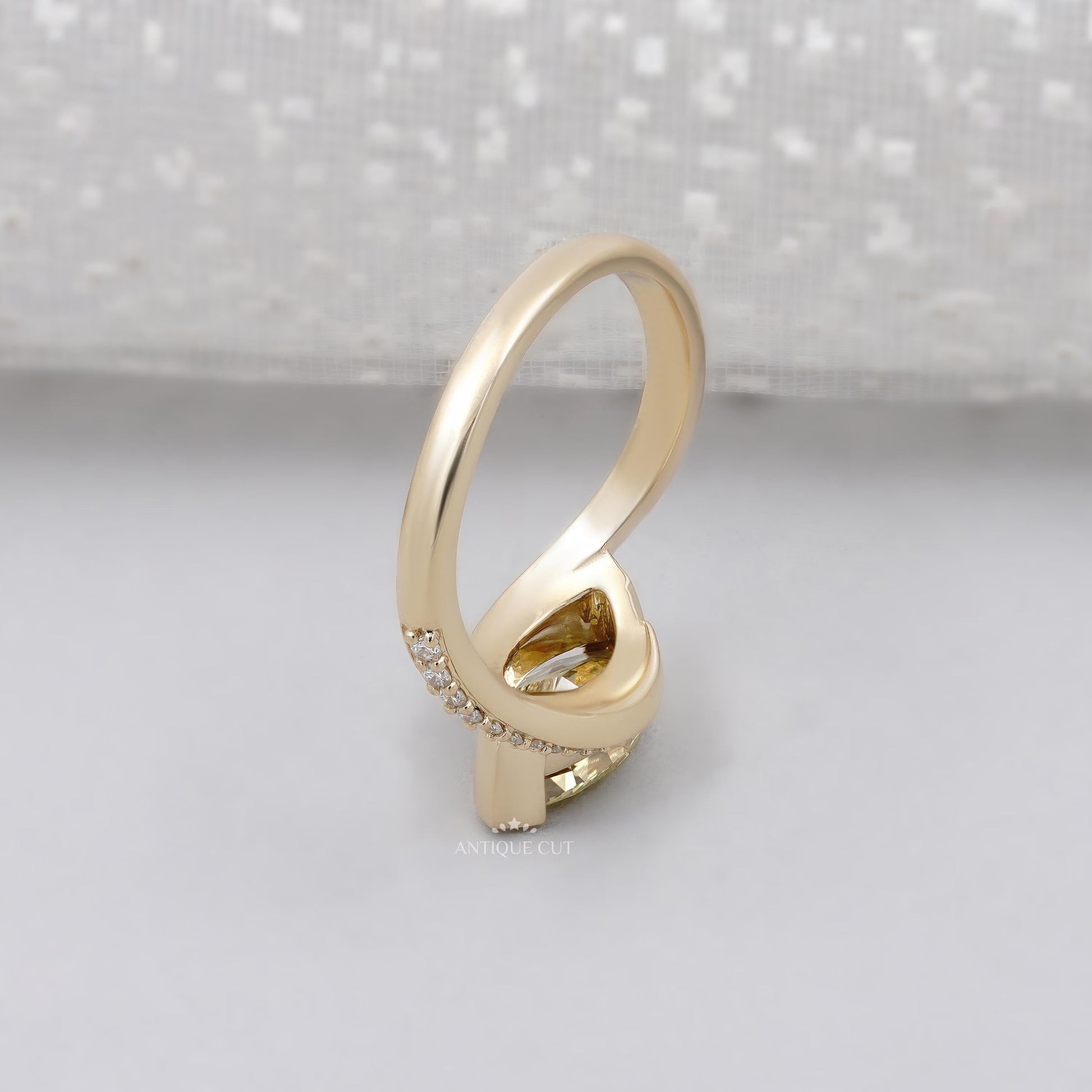 IGI Certified marquise cut fancy yellow diamond ring