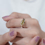 Elegant bypass engagement ring with marquise yellow diamond