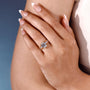 4 claw prong emerald cut engagement ring