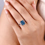 Lab grown blue diamond ring with trapezoid accent stones