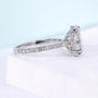 White gold cathedral hidden halo engagement ring design