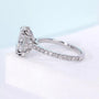 IGI certified oval diamond engagement ring with hidden halo detail