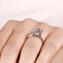 Cathedral setting oval diamond ring with hidden halo accents