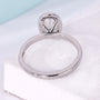 Women’s oval cut engagement ring with modern bezel style