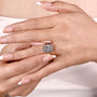 Antiquecut engagement ring with floral halo and yellow gold band