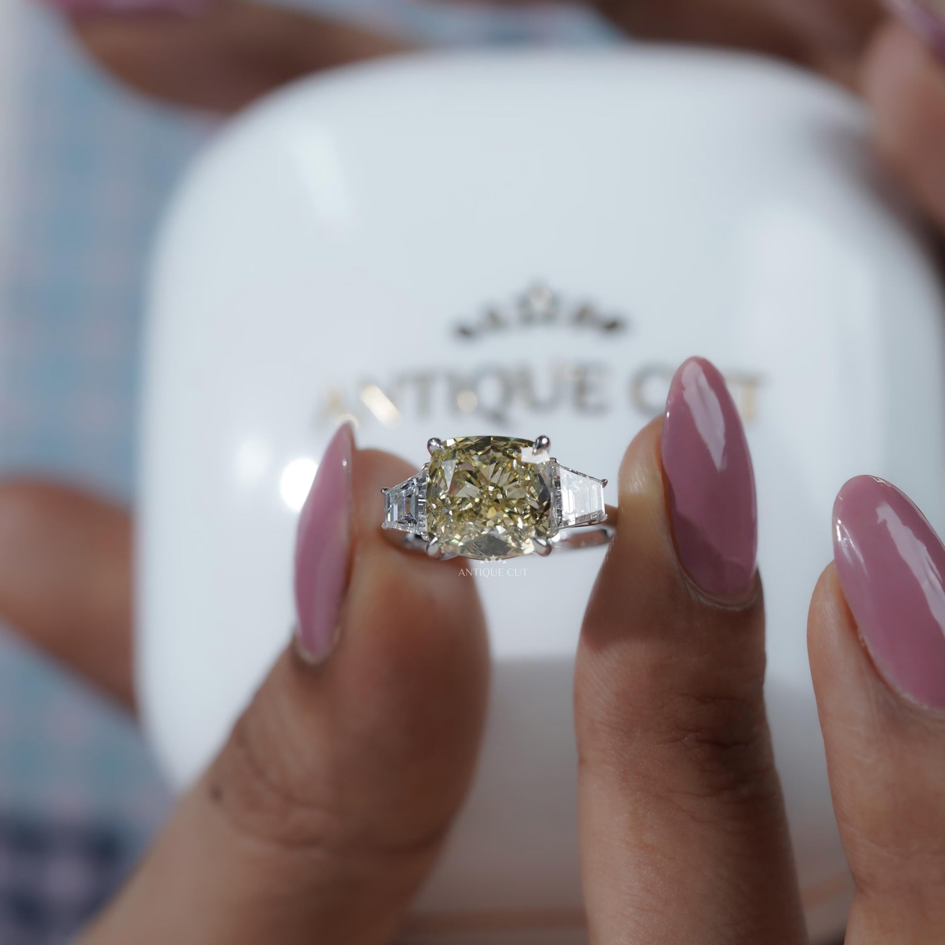 Luxury cushion cut fancy yellow diamond three stone ring
