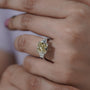 Elegant cushion cut diamond ring with tapered baguette sides