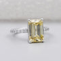 Yellow diamond solitaire engagement ring with round pave band