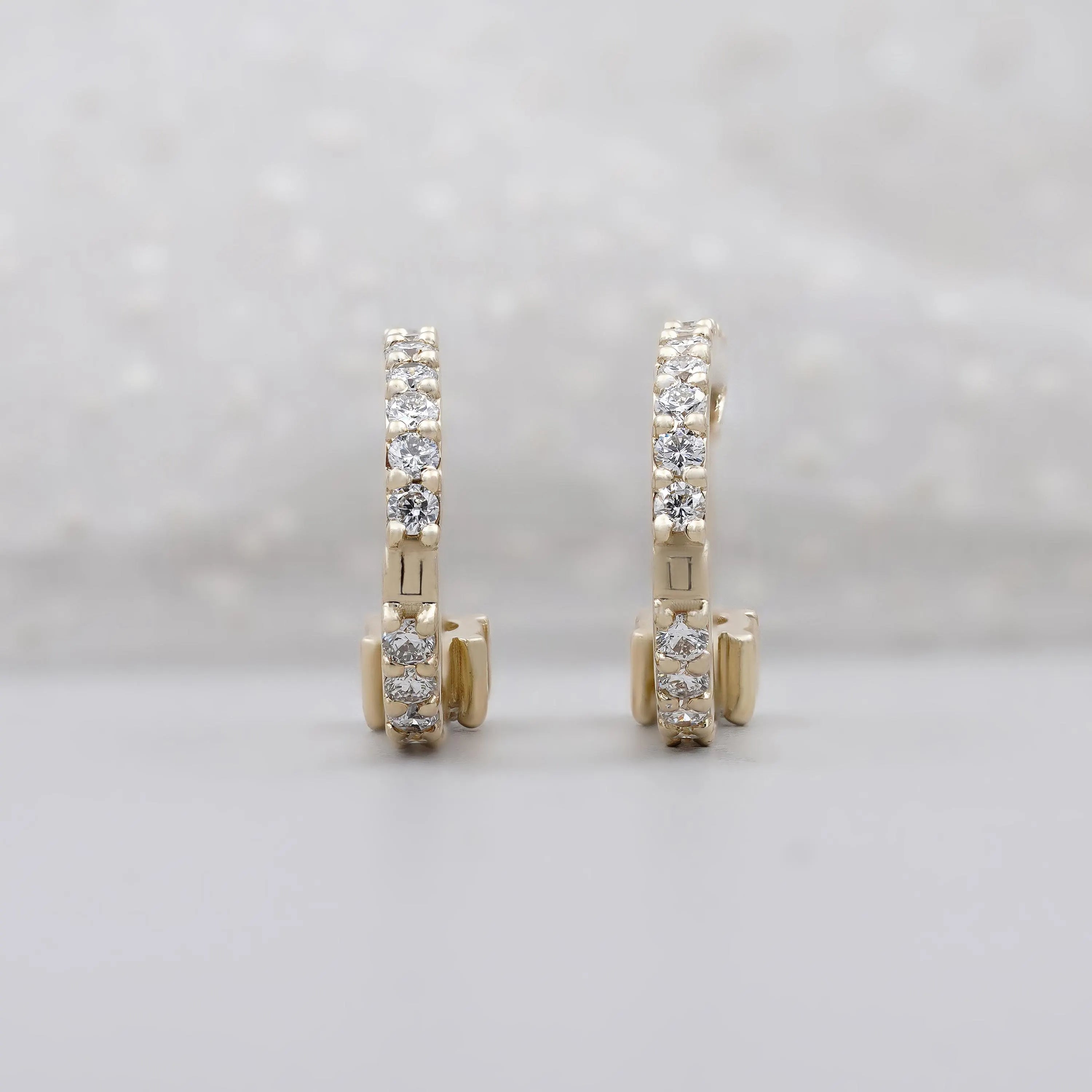 Diamond hoop earrings in yellow gold