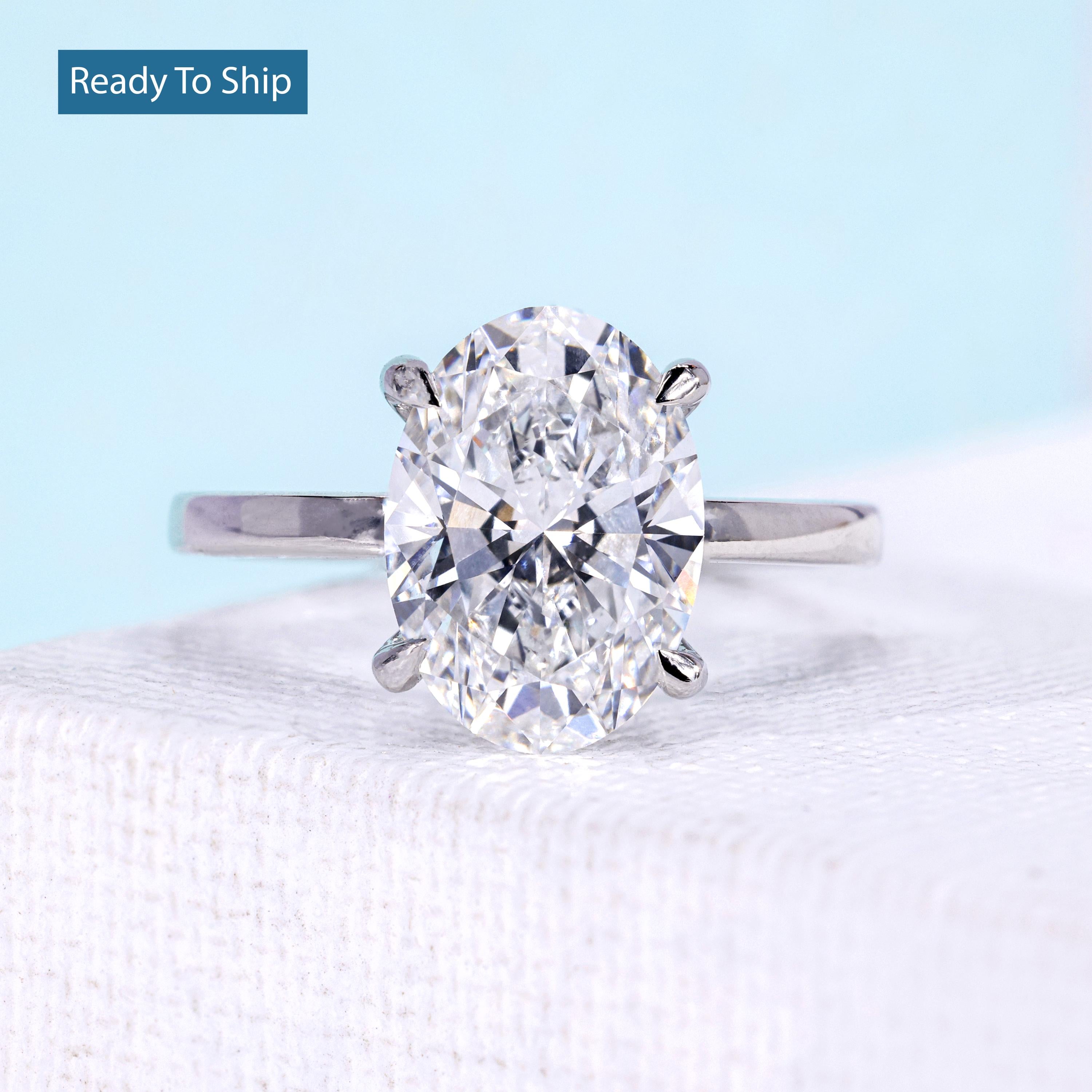 Oval solitaire engagement ring with 3 carat oval diamond in white gold