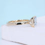 Yellow gold east west engagement ring with radiant cut lab grown diamond