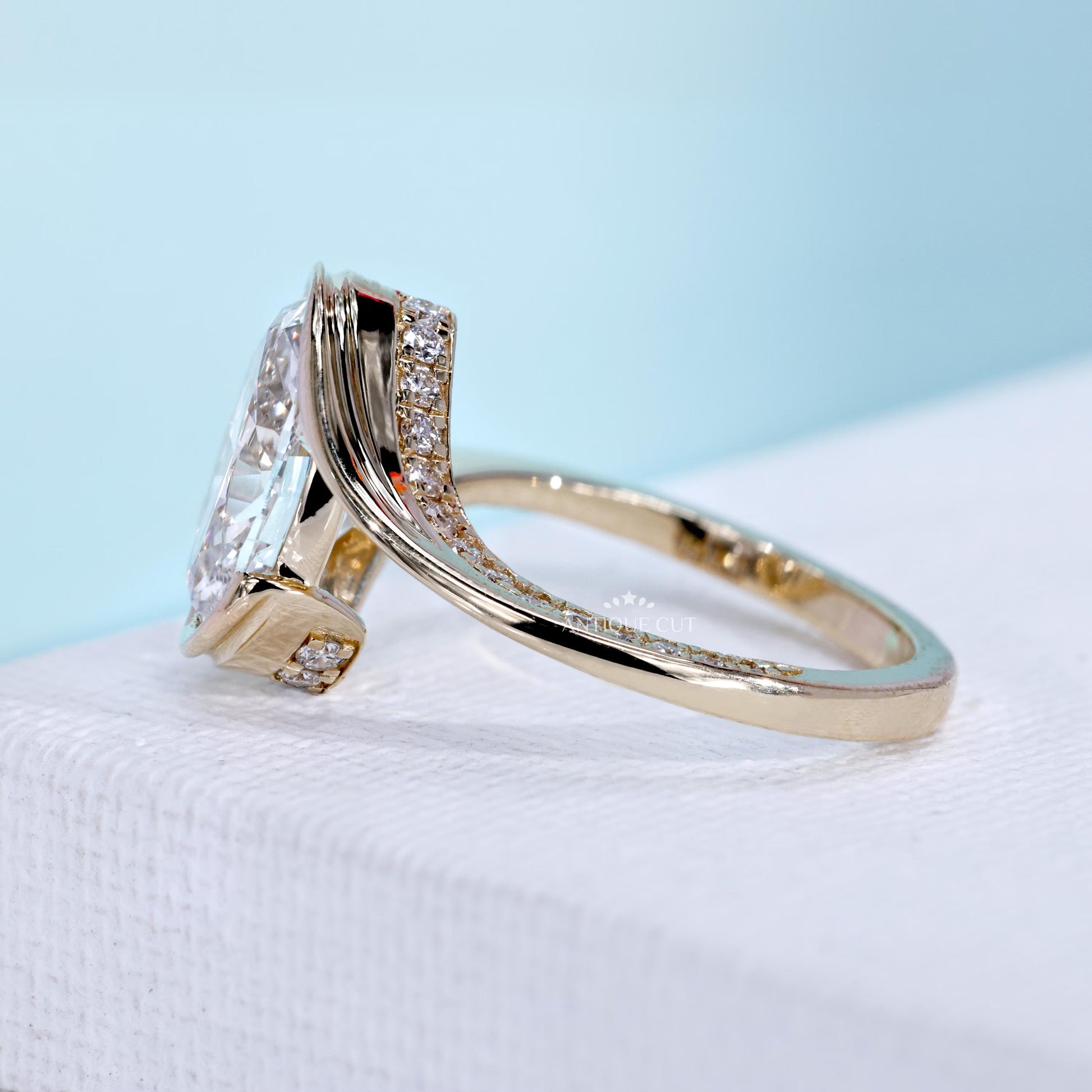 Yellow gold oval diamond bypass ring design