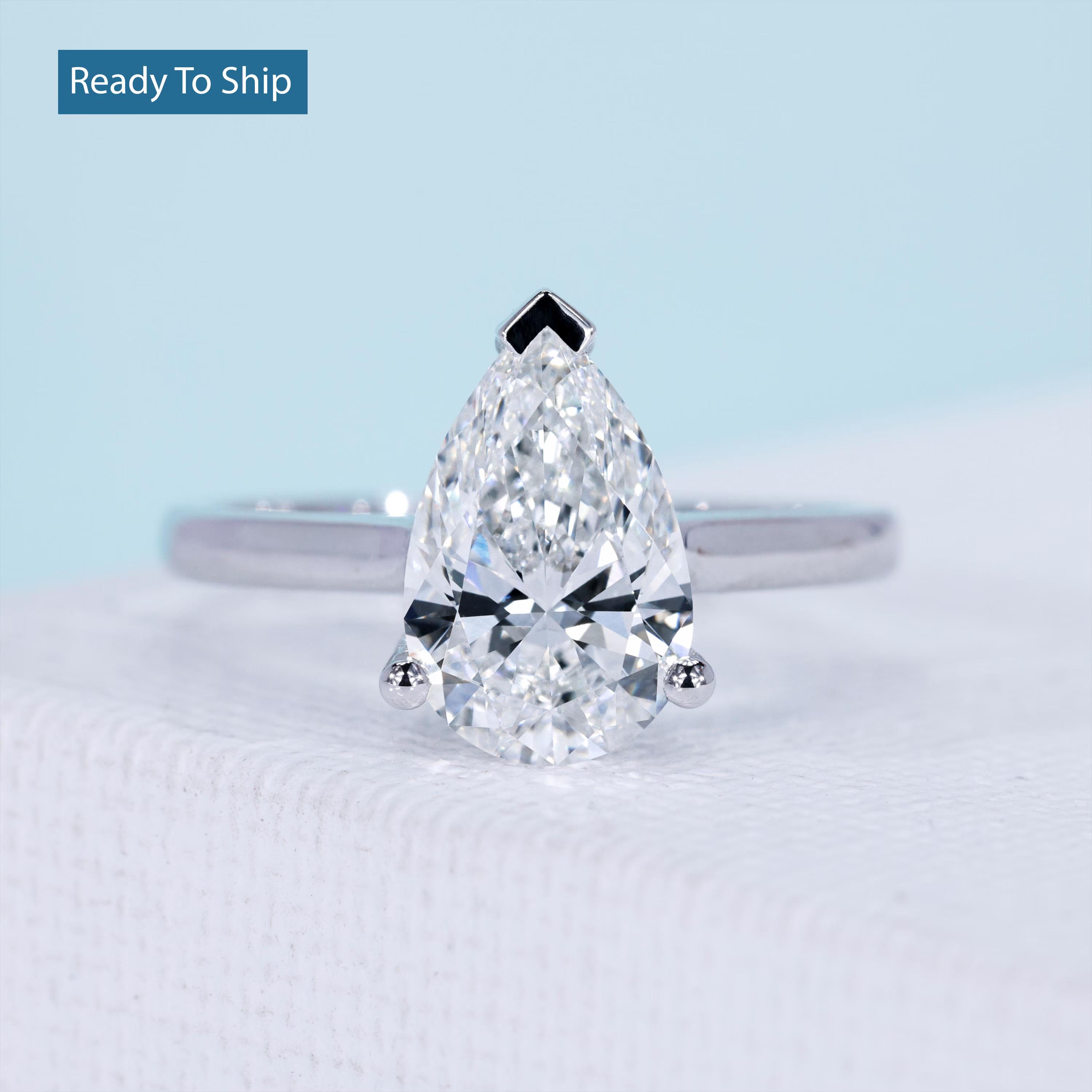 Pear cut lab grown diamond engagement ring white gold