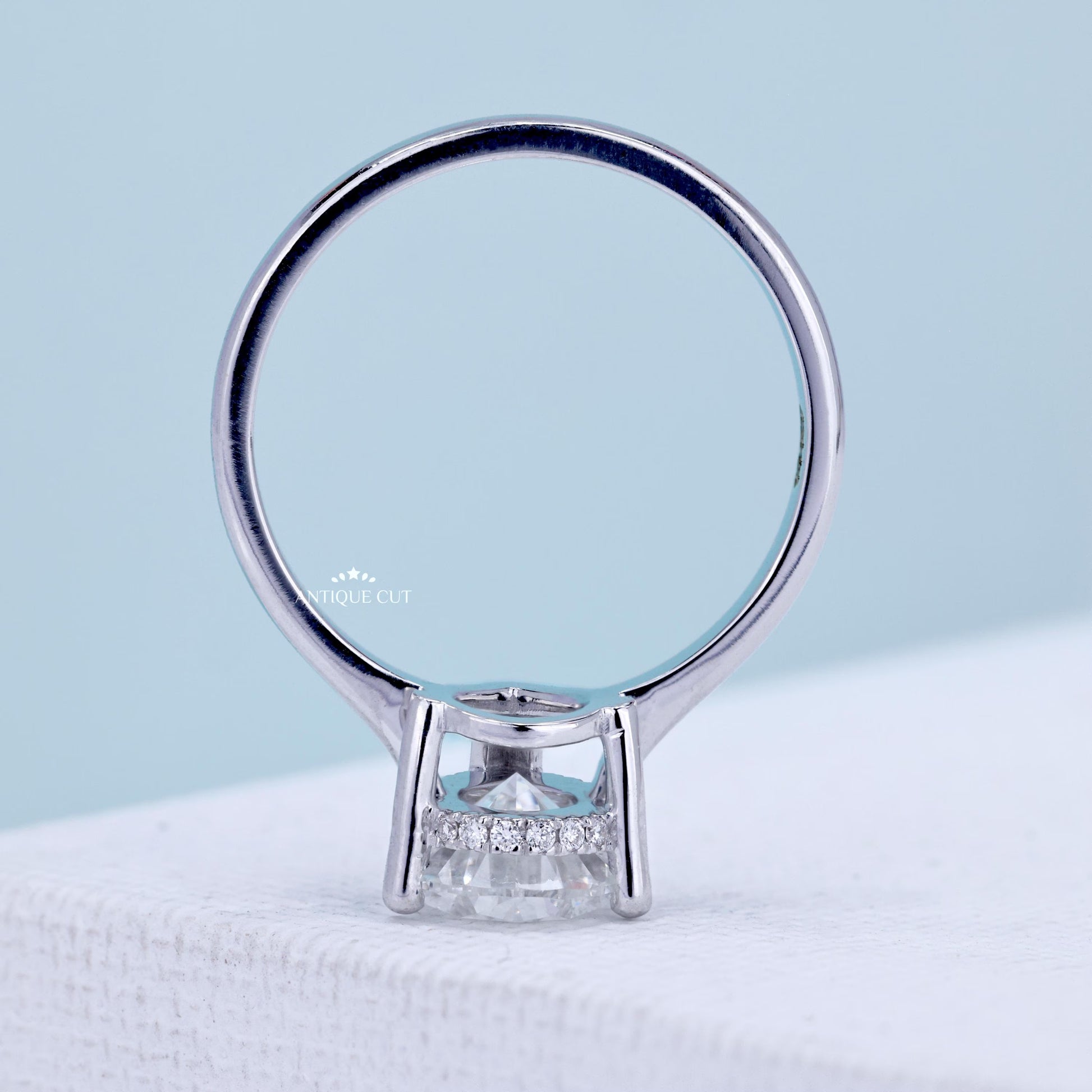 Hidden halo pear cut diamond ring white gold