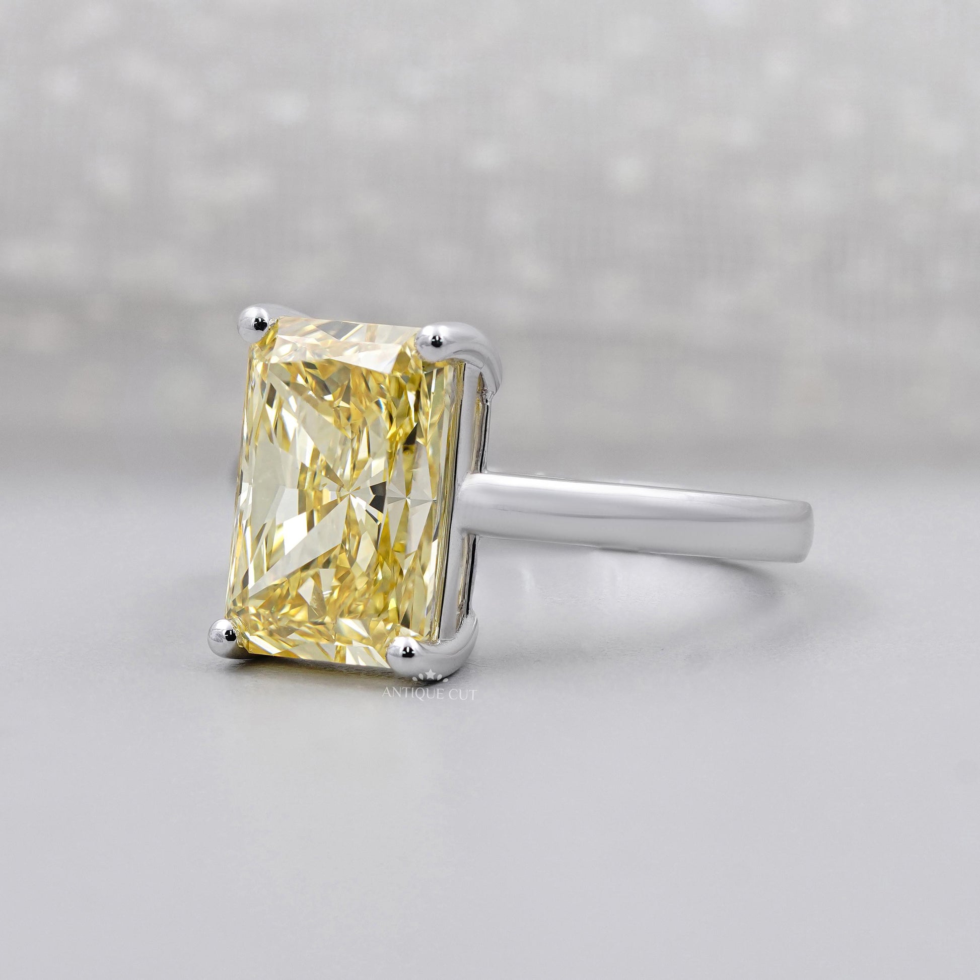 IGI certified yellow radiant diamond ring white gold