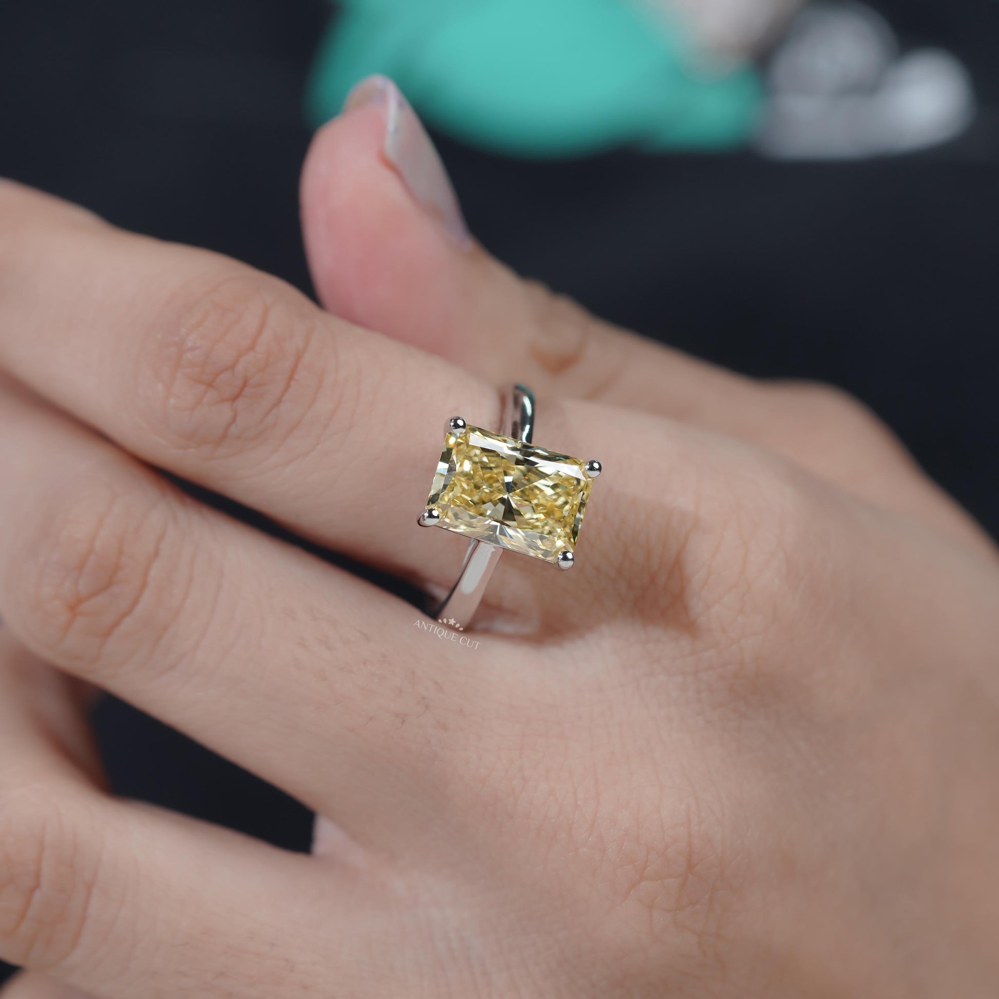 Elegant yellow radiant solitaire engagement ring