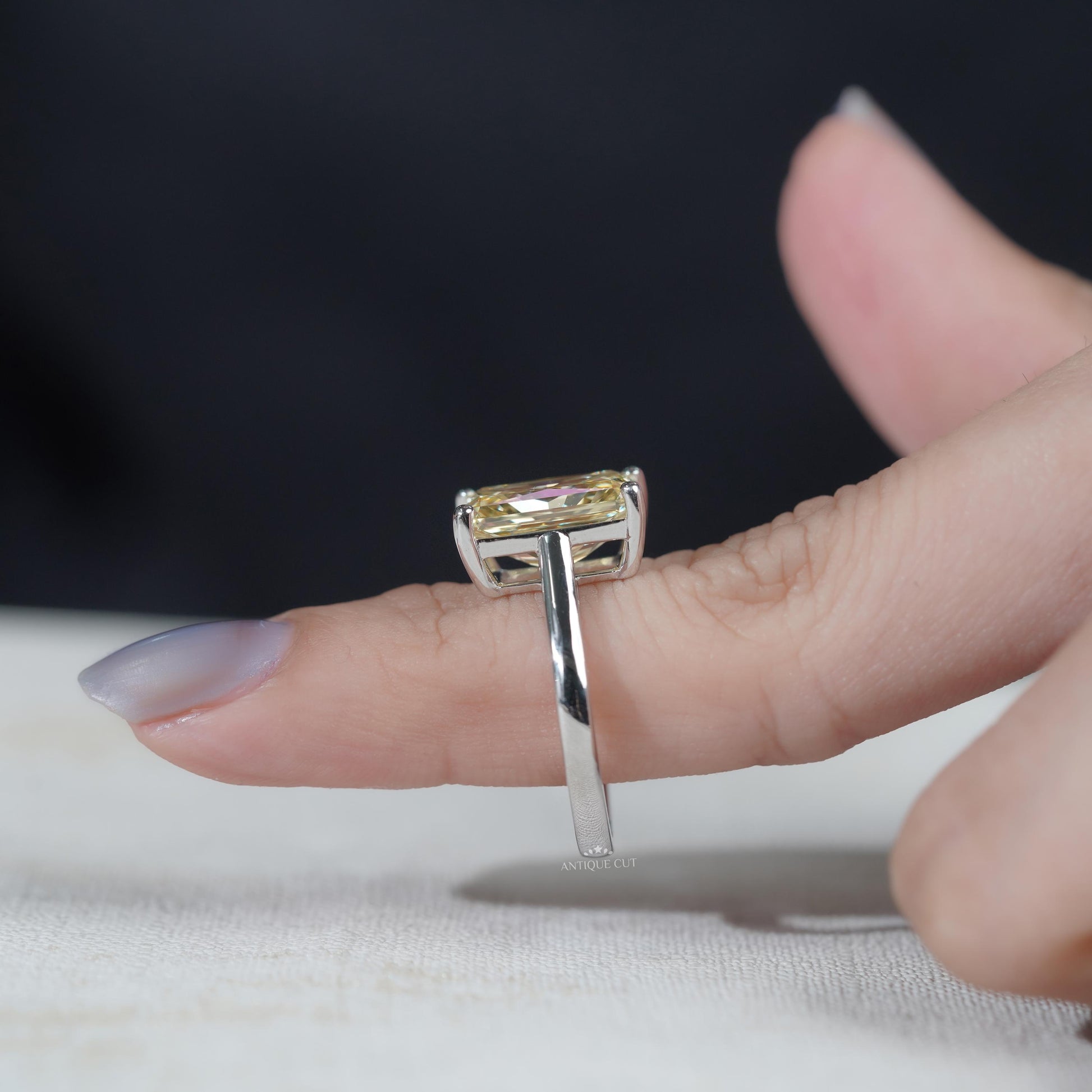 White gold bridal ring with yellow diamond solitaire
