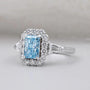 IGI Certified radiant cut blue topaz diamond ring