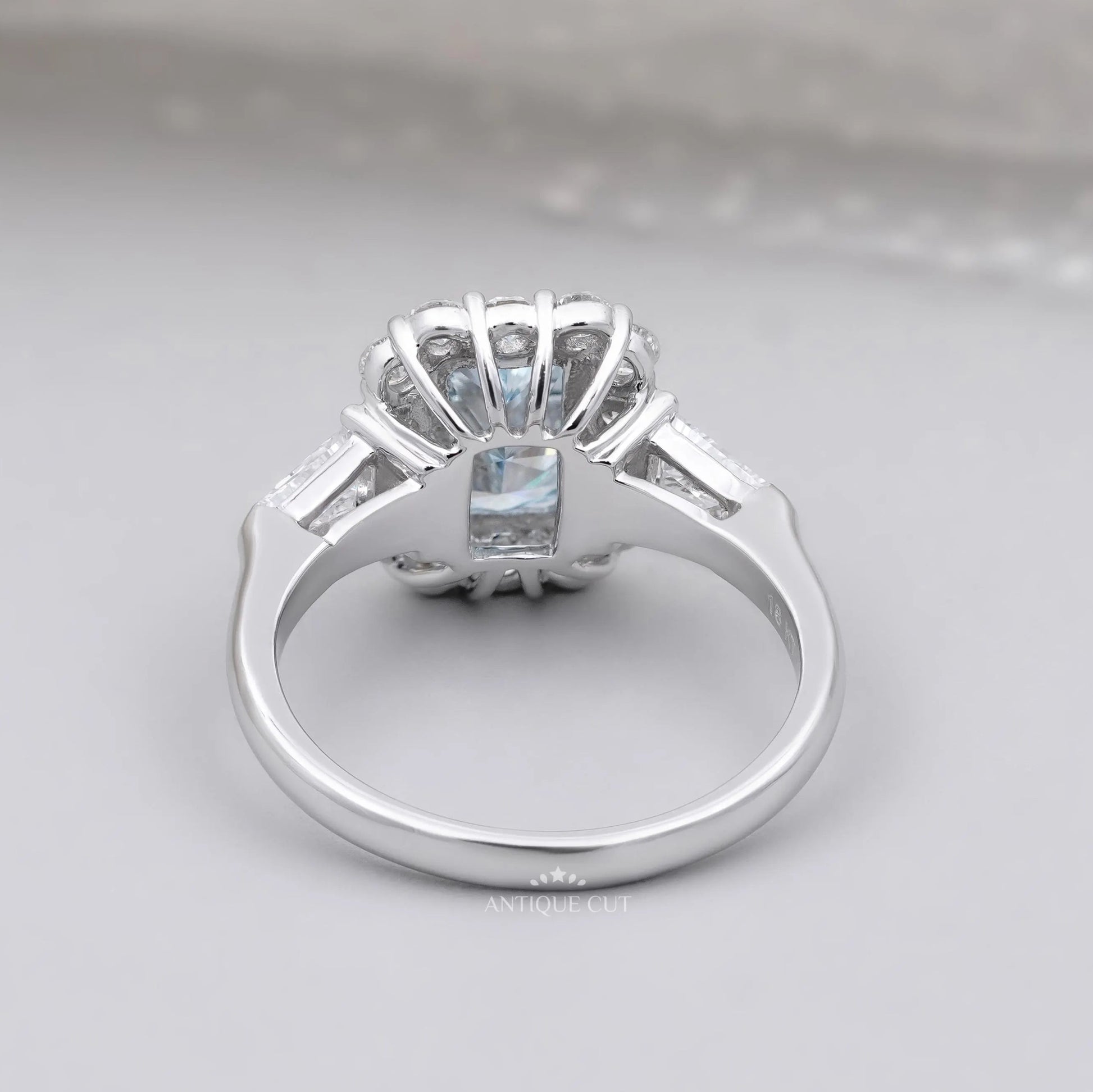 Lab grown diamond halo ring with radiant blue topaz center