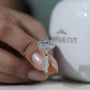 Antiquecut white gold blue topaz halo ring