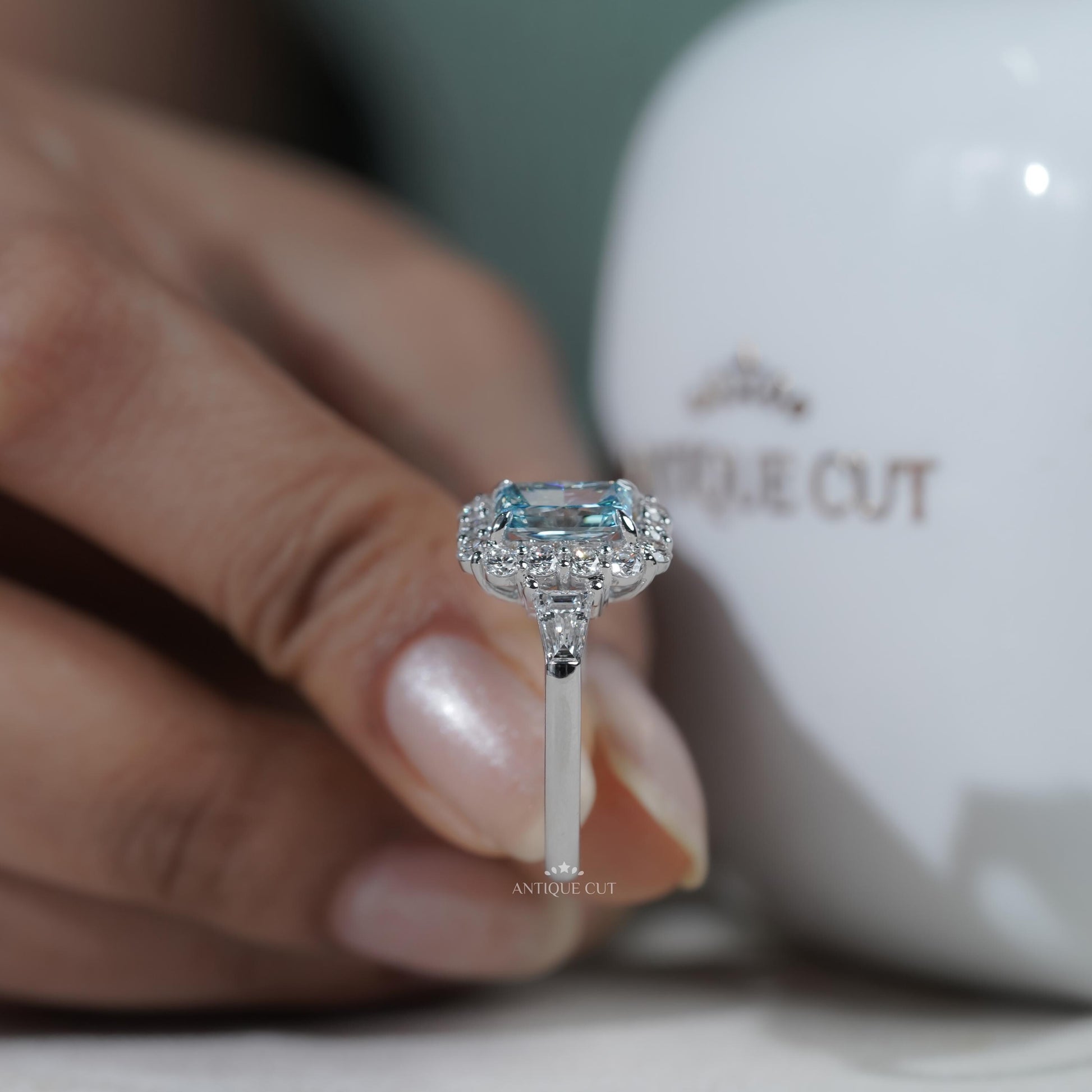 Antiquecut white gold blue topaz halo ring